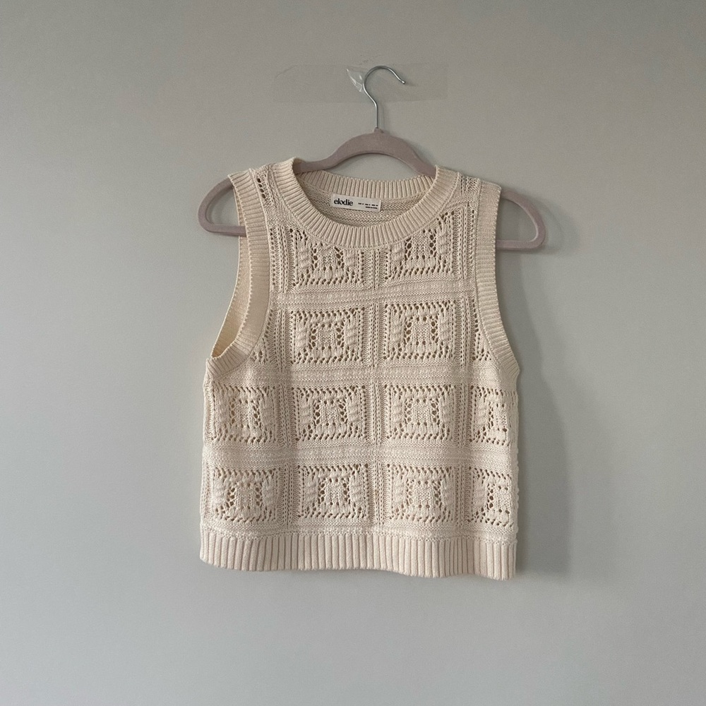Crème design sweater vest
